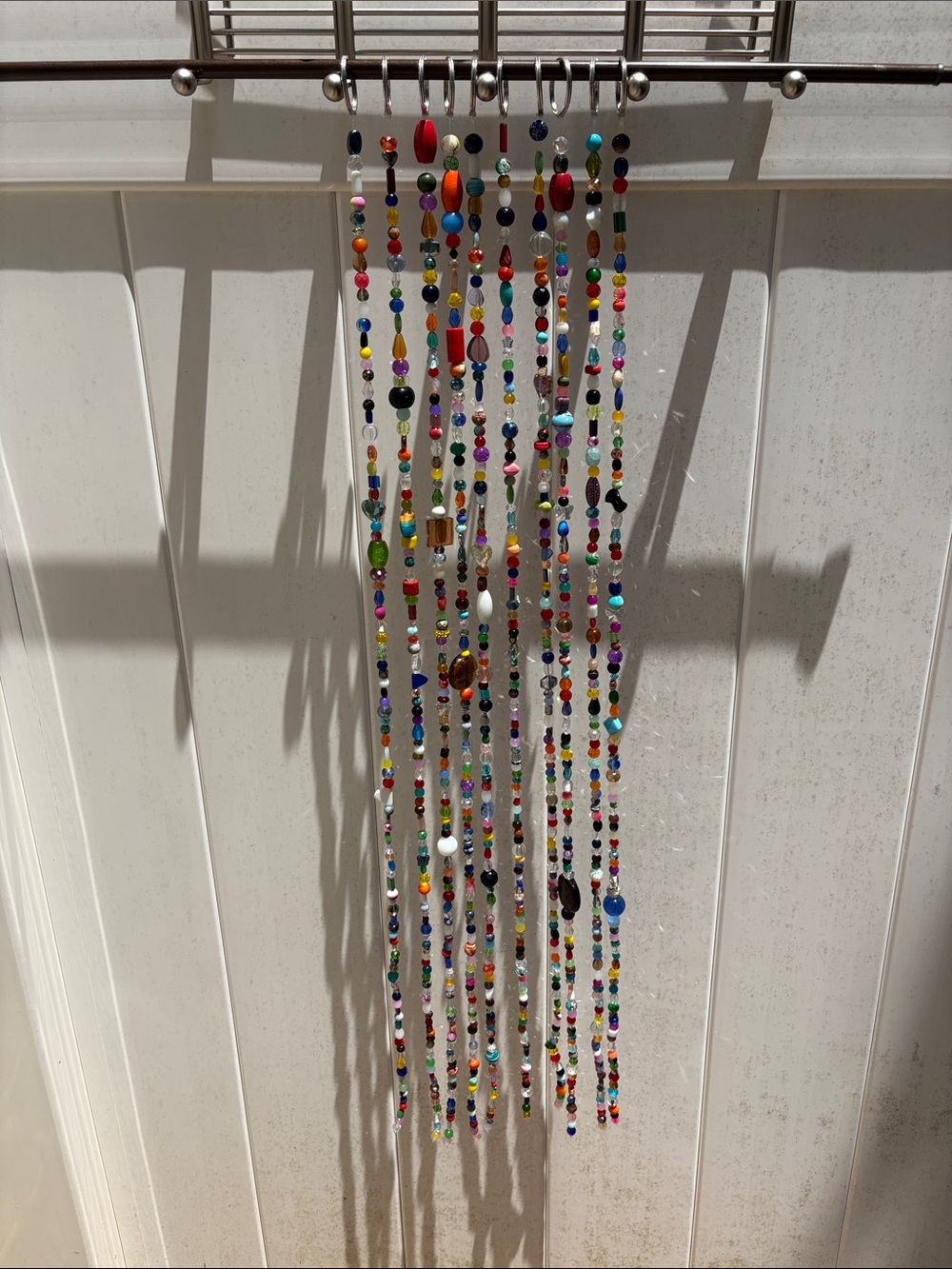 10 strands 34 inches long made with glass beads